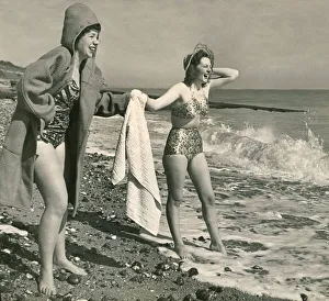 Waves Prints: Two Women Barbra Howes 20 and Sylvia Hansen Holidaymakers came in duffle coats over their