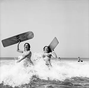 Holidaymakers Prints: Women body boarding in the surf at Newquay June 1960 M4303-002
