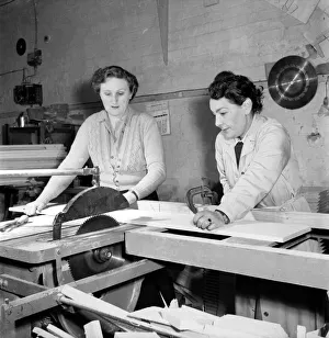 Workshop Prints: Women carpenters constructing an ironing board in a workshop. 1954 A95-003
