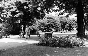 00686 Collection: Two women and a child walking through Albert Park in Middlesbrough. 26th June 1979