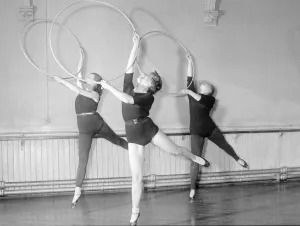 Women exercising with hoops at the B. A. I. The Birmingham Athletic Institute offers many