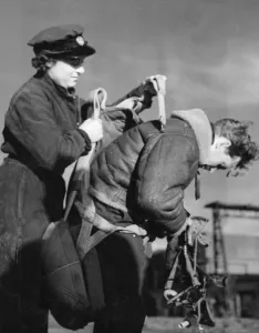 Parachute Prints: Women flight mechanics are working for the R. A. F. in Flying training Command