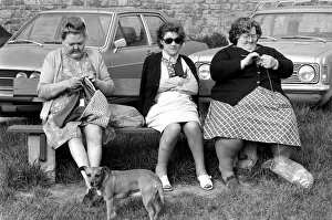 Gossip Prints: Three women with larger figures seen here knitting whilst their children play in a poorer