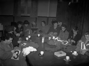 Women mend the shirts of Yeovil Town football club as they preapre for their upcoming