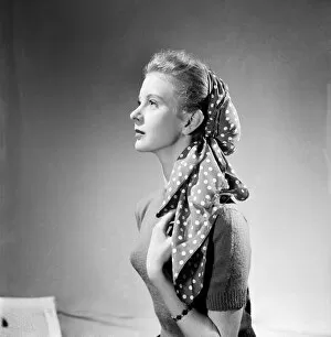 00013 Collection: Women modelling an adaptable scarf. June 1952 C3240