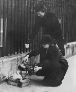 Determination Prints: Women residents of London making themselves a little fire for a morning cup of tea in
