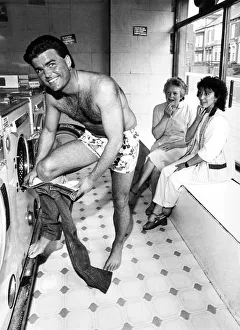 Jeans Prints: Women shoppers stop and stare as Tony Carlisle takes off a well known T