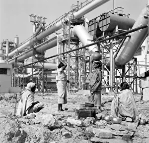 Heavy Industry Prints: Women water carriers seen here at the Durgapur steel works in West Bengal, India