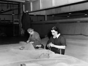 Women weaving the carpet far westminster Abbey and the coronation. March 1953 D1554-005