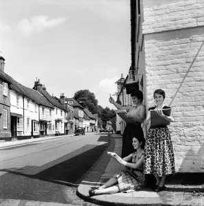 Skirt Prints: Women of West Wycombe in Buckinghamshire standing in the street making sketches of local