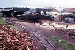 Dramatic Prints: Wood burning steam locomotives at rail centre od caala of port lobito