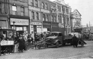 Vegetables Prints: Woolwich Market, South London, and a queue for oranges and other fruit and vegetables