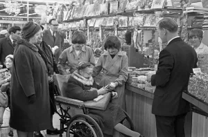 00096 Prints: Woolworths, Rugby. Staff stay on to assist disabled shoppers with their Christmas