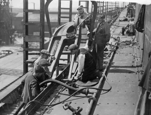 Dock Prints: Work being carried on a ship of the Ellerman Lines, a cargo ship. Liverpool