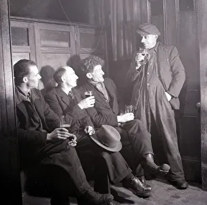 Conversation Prints: Work mates sit in the snug and enjoy a cigarette and a pint of beer following a hard days