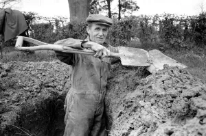 Manual Prints: Is work wonderful?. Feature. Grave Diggers at work in the grave yard of Windlesham Church