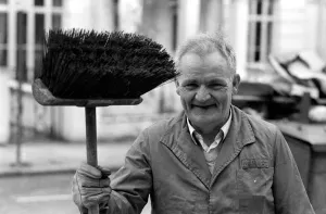00058 Prints: Is work wonderful?. Feature. At work in Nottinghill Gate West London road-sweeper John