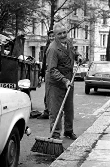 Is work wonderful?. Feature. At work in Nottinghill Gate West London road-sweeper John