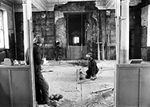 A worker is supervised inside the Queens Hotel section of the old Curzon Street Station