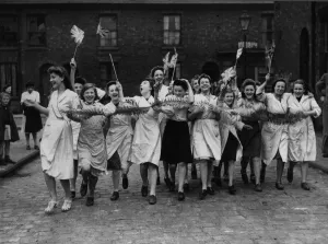00095 Prints: Workers celebrate Victory in Europe Day in Manchester at the end of the Second World War