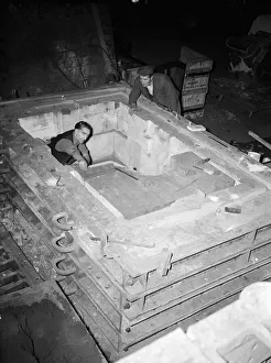 Two Men Only Prints: Workers at K & L Steel Founders and Engineer Limited seen here preparing a cast for