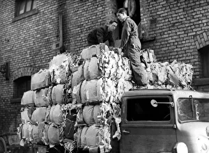 00421 Prints: Workers load a lorry with 50 bales of salvaged paper weighing three tons at Newcastle
