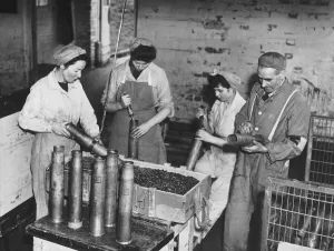 Workers at the Royal Ordinance factory at Chorley in Lancashire destroy shells at the end