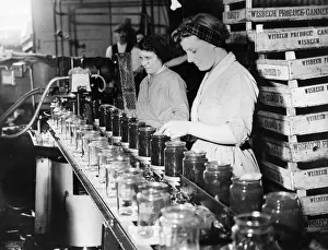 Workers at Wisbech Smedleys Cannery works bottle and can locally grown fruit