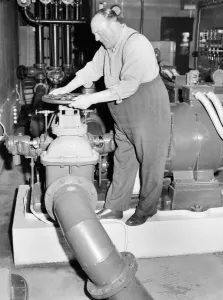 Workman: Man who turns on the pumps for the Trafalgar Square fountains. 1957 A88-007