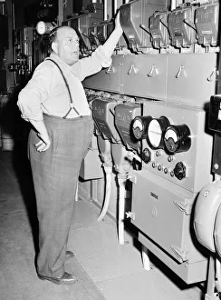 Workman: Man who turns on the pumps for the Trafalgar Square fountains. 1957 A88-003