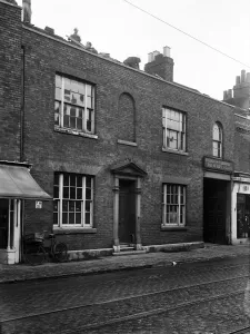 Outer London Prints: Workman repairing the roof Harmans brewery in Uxbridge High Street, Uxbridge