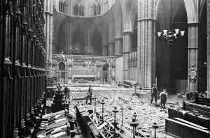 Workmen clear away debris from collapsed Lantern Roof from Westminster Abbey