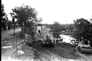 Workmen construct a £250, 000 temporary Bailey bridge over the River Tyne