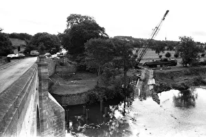 Workmen construct a £250, 000 temporary Bailey bridge over the River Tyne