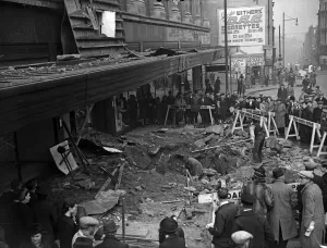 Shops Prints: Workmen filling a crater outside Greys department store, Bull Street