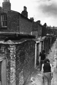 Alley Prints: Workmen making general improvements to the narrow back passageways of a street in Everton