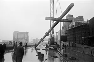 Christian Prints: Workmen moving Britains tallest free-standing cross into position at Carrs Lane