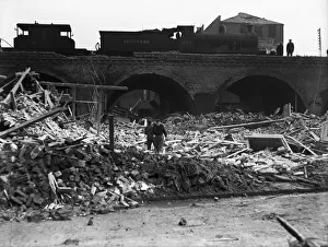 Railway Line Prints: Workmen search through the rubble following a V2 attack on Camberwell