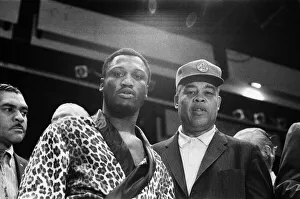 Dressing Gown Prints: World Champion Joe Frazier (left) seen here with former World Champion Joe Louis