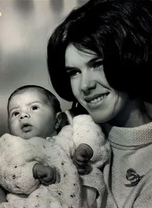 Former World Champion racing driver Jackie Stewart with his Wife Helenand one month old