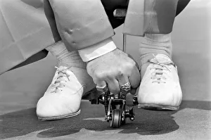 00347 Prints: World smallest bike: Charlie Charles pedals the world smallest ridable bicycle