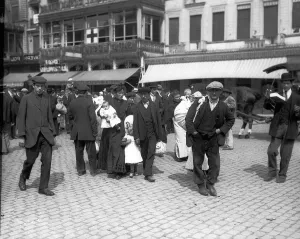Refugees Prints: World War One Brussels Street Scene August 1914 A family of refugees reach