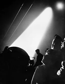 Light Prints: World War Two A composite image showing children looking up