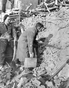 Searching Prints: World War II: Hospital. Divining for Radium among the wreckage of what was the Marie