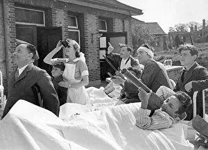 World War II: Hospitals. Nurses and patients watch the dogfights between the R. A. F