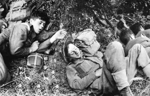 Allies Prints: World War II Invasion of France Canadian troops rest under a hedge in the Normandy