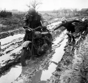 Scenic Prints: World War II Invasion of Holland A British army dispatch rider stuck in the mud gets a