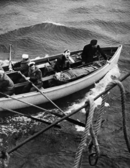 Life Boats Prints: World War II: Shipping survivors from a boat attack on an Atlantic convoy