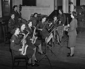 Saxaphone Prints: World War II Women: The A. T. S. Dance band with their conductor Junior Commander Angela
