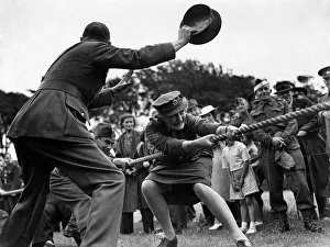 Strength Prints: World War II Women: ATS women take part in a tug of war competition. August 1941 P010065